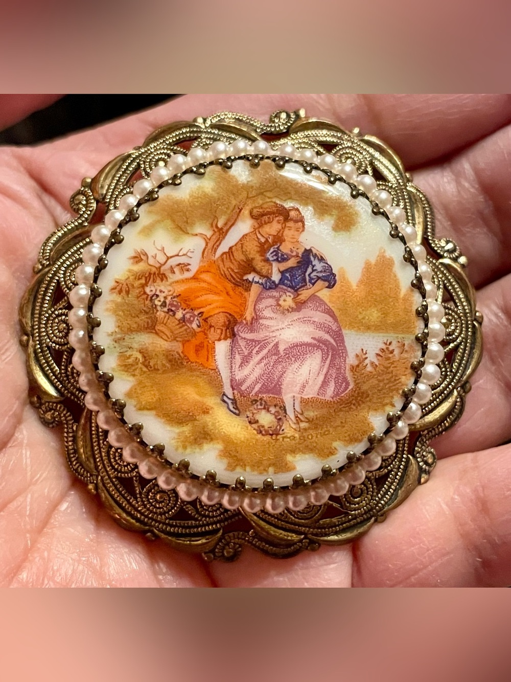 Ornate Gold-Tone Porcelain Cameo Brooch with Pastel Scene
